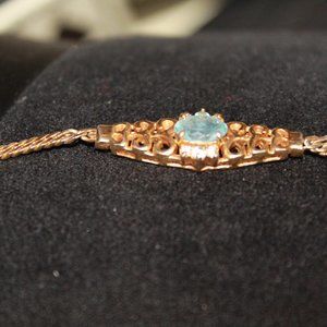AVON Gold tone blue stone filigree herringbone box clasp bracelet